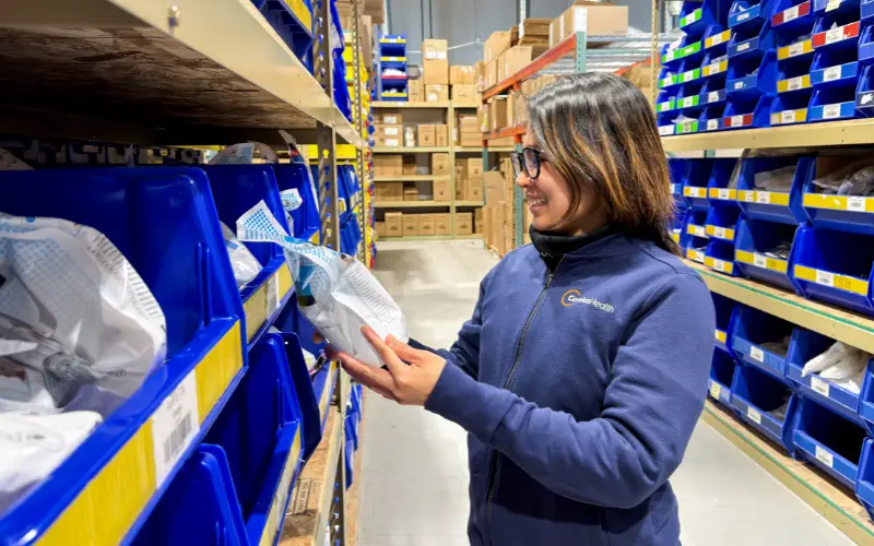 A Careica Health Materials Management worker helps out in the warehouse